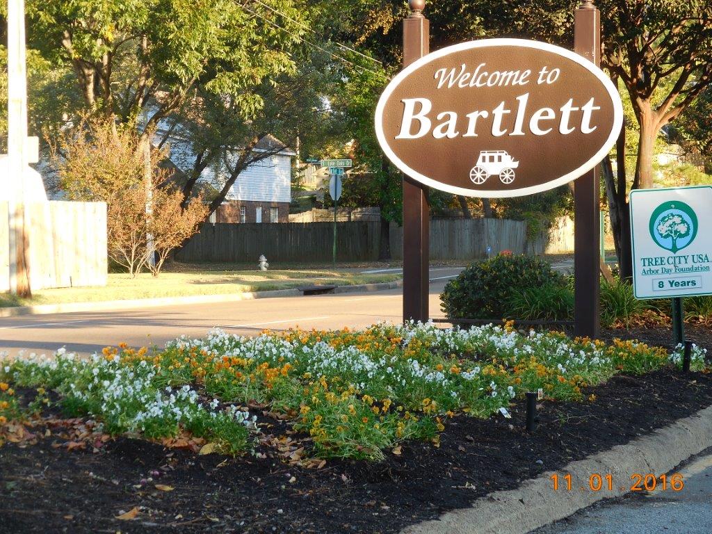 Flowerbed by the Barlett sign