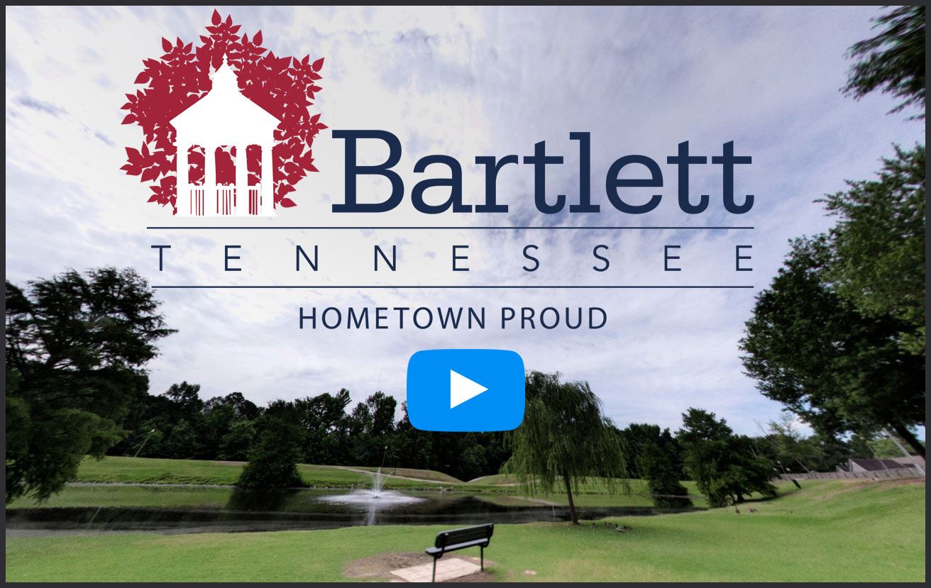 City park picture in front of fountain on pond